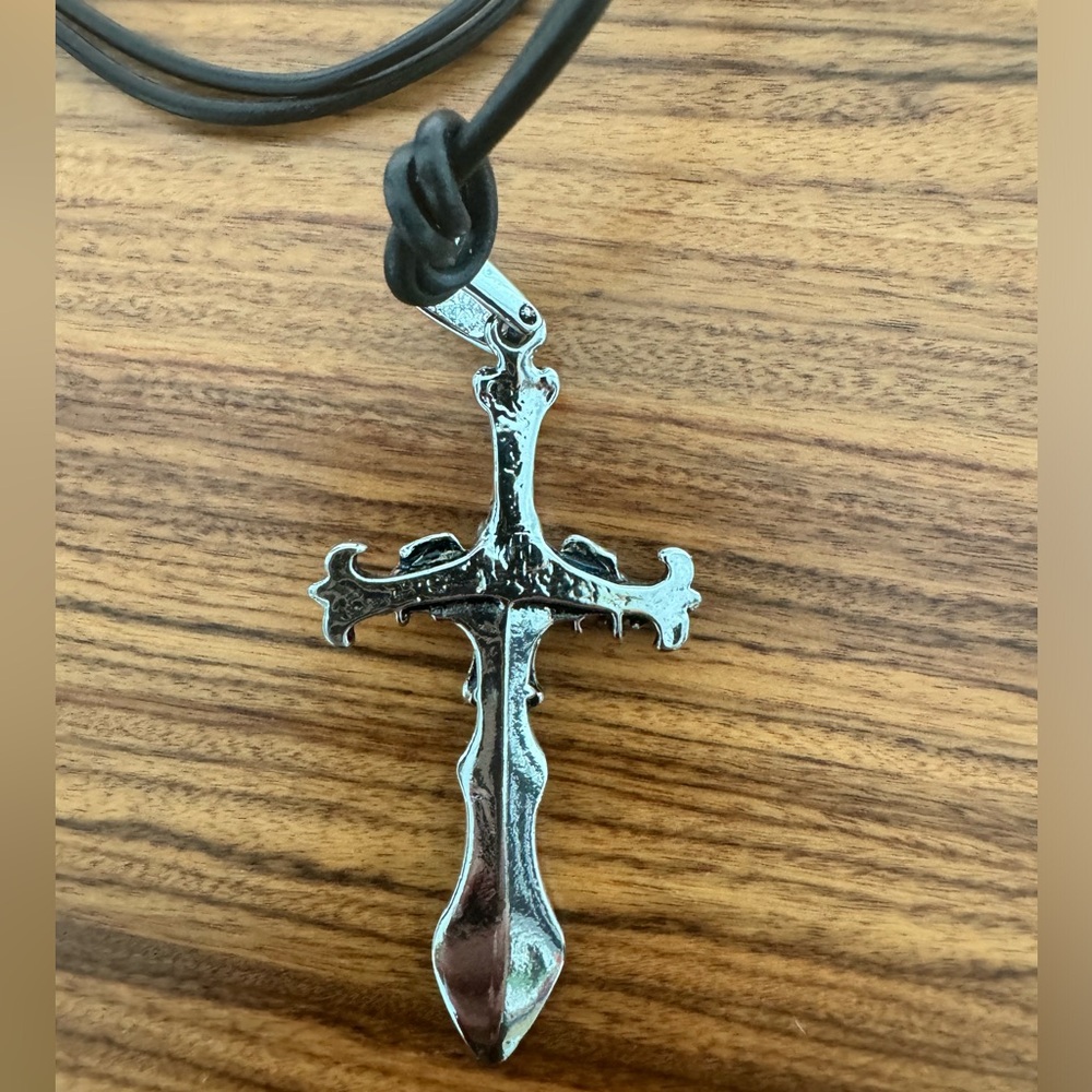 Necklace with adjustable black cord. Unisex